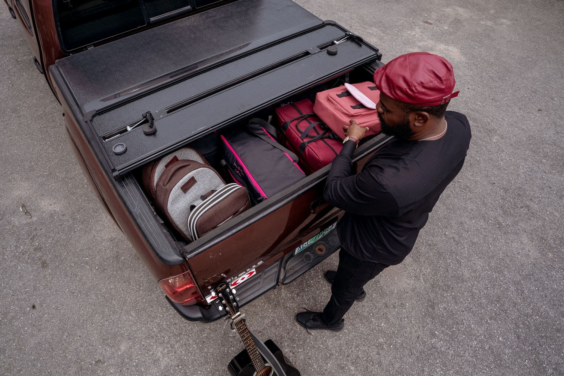 Packing Lightbulb bags into the back of a pickup truck